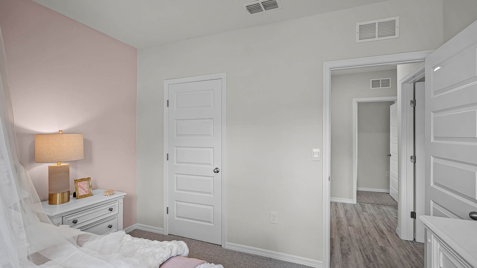 Guest bedroom with carpet throughout