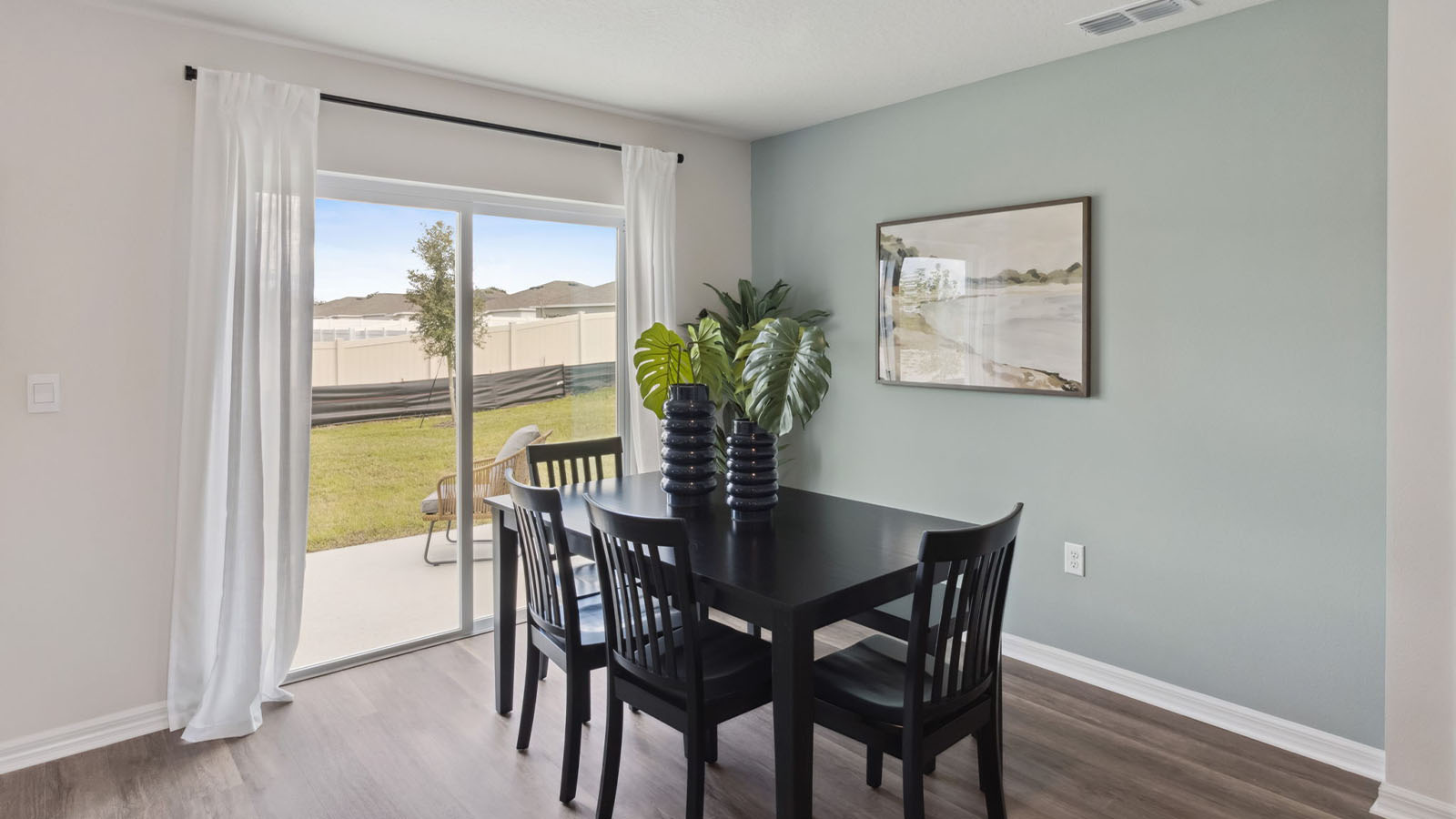 Dining room table with sliding patio door