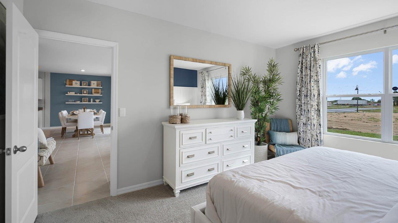 View of the living room from the primary bedroom