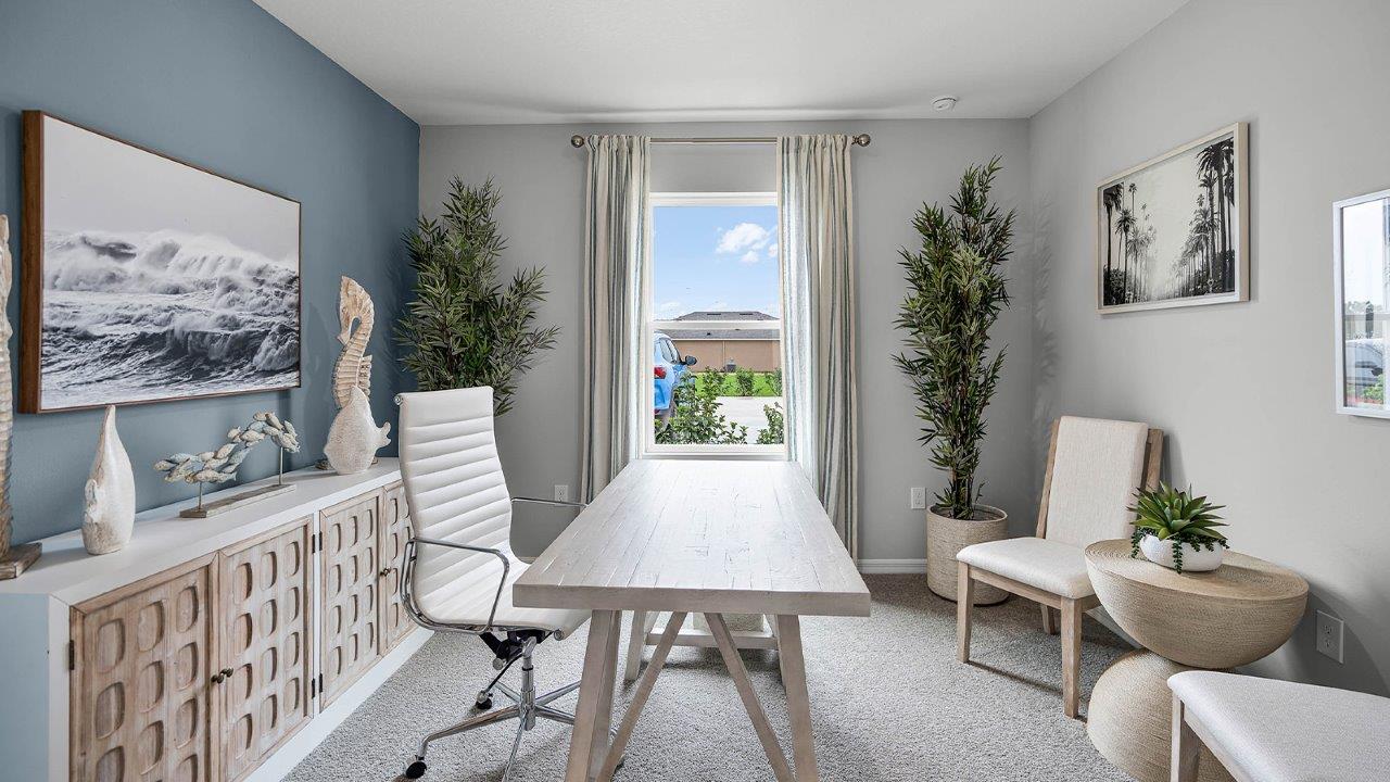 Office space with desk and chair and window