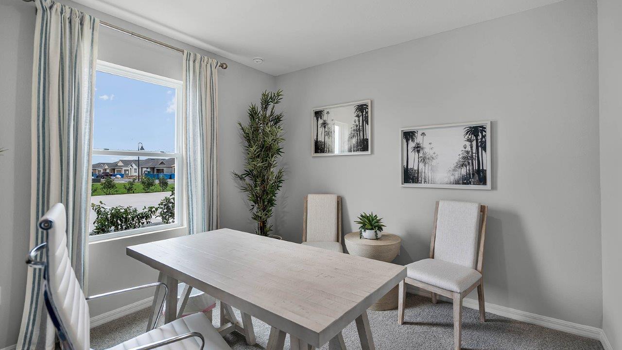 Office space with desk and chair and window