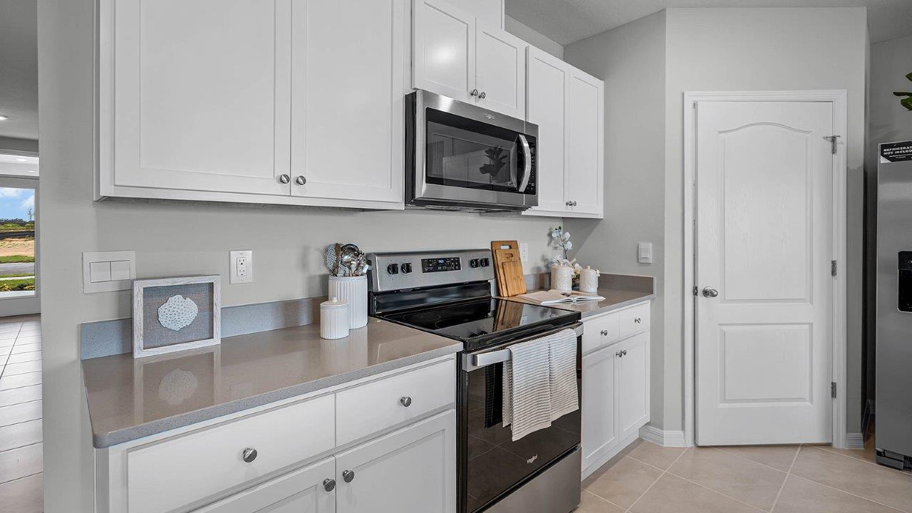 Kitchen countertops with stove and microwave