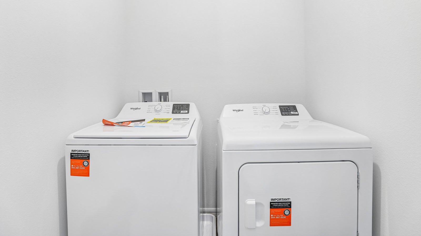 Laundry room with washer and dryer