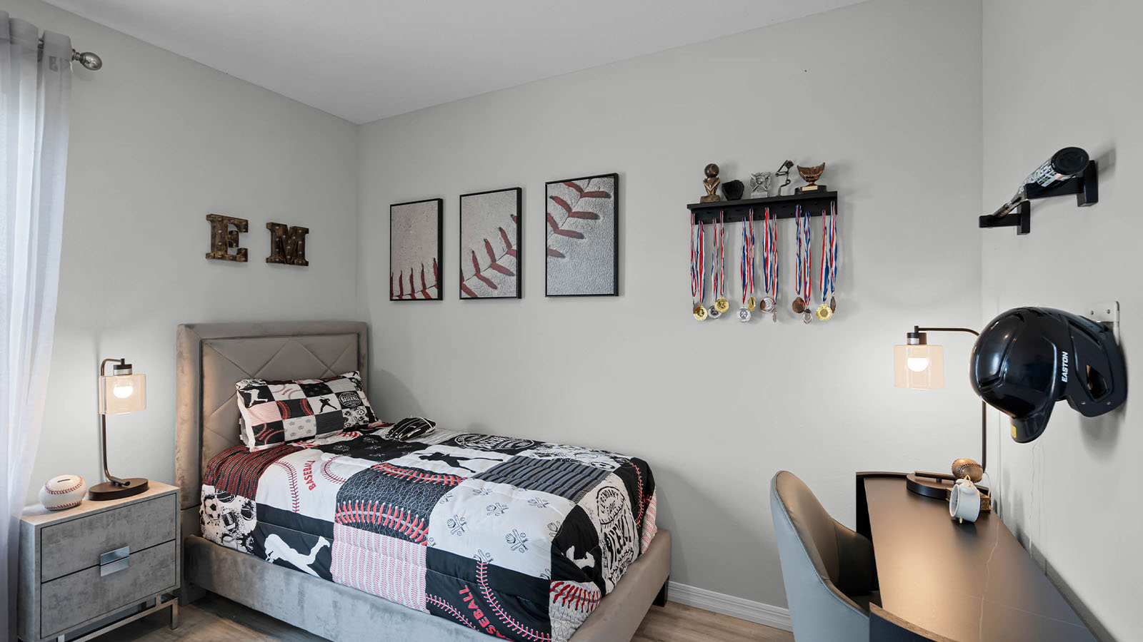 Guest bedroom decorated as baseball theme