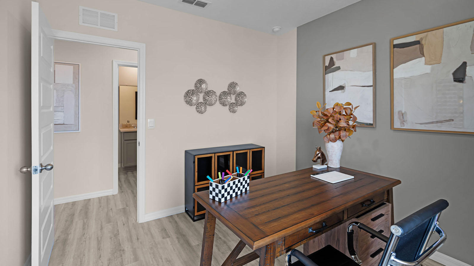Office with desk and chairs