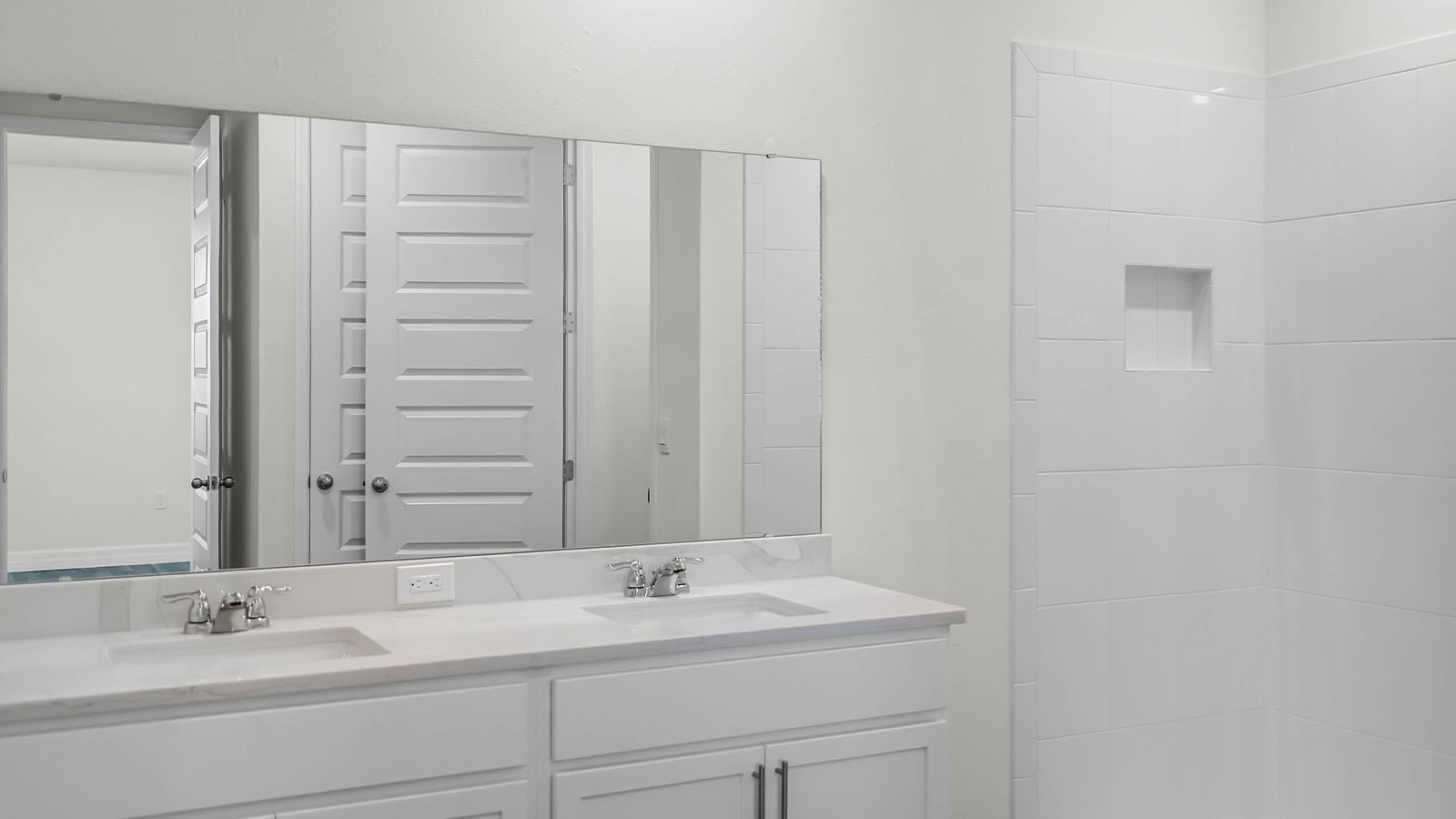 primary bathroom with double vanity sink