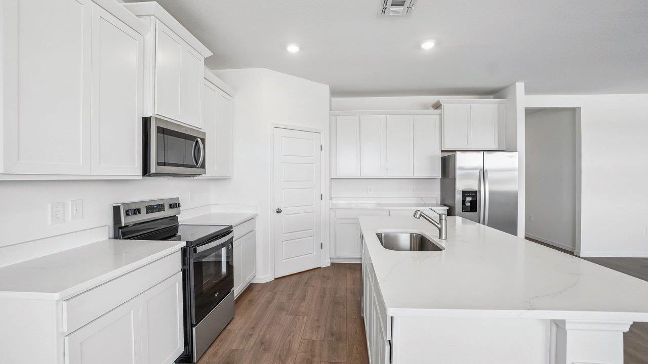 Kitchen with stainless steel appliances