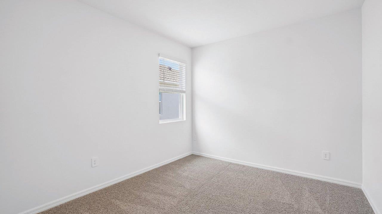 Guest bedroom with carpet floors