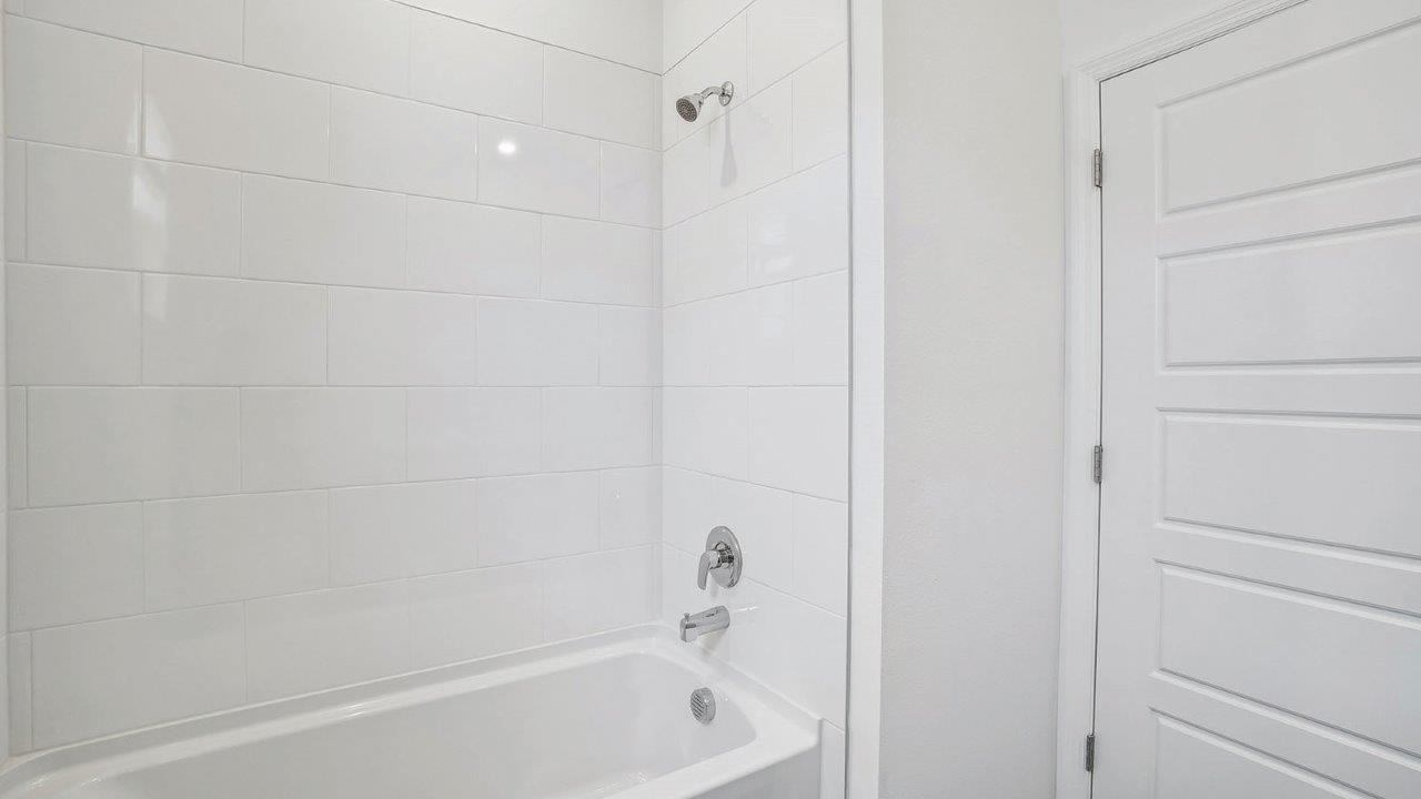 Guest bathroom with tub