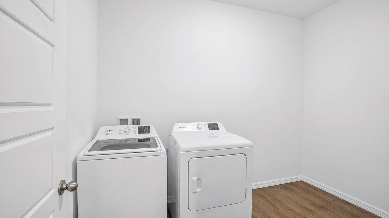 Laundry room with washer and dryer