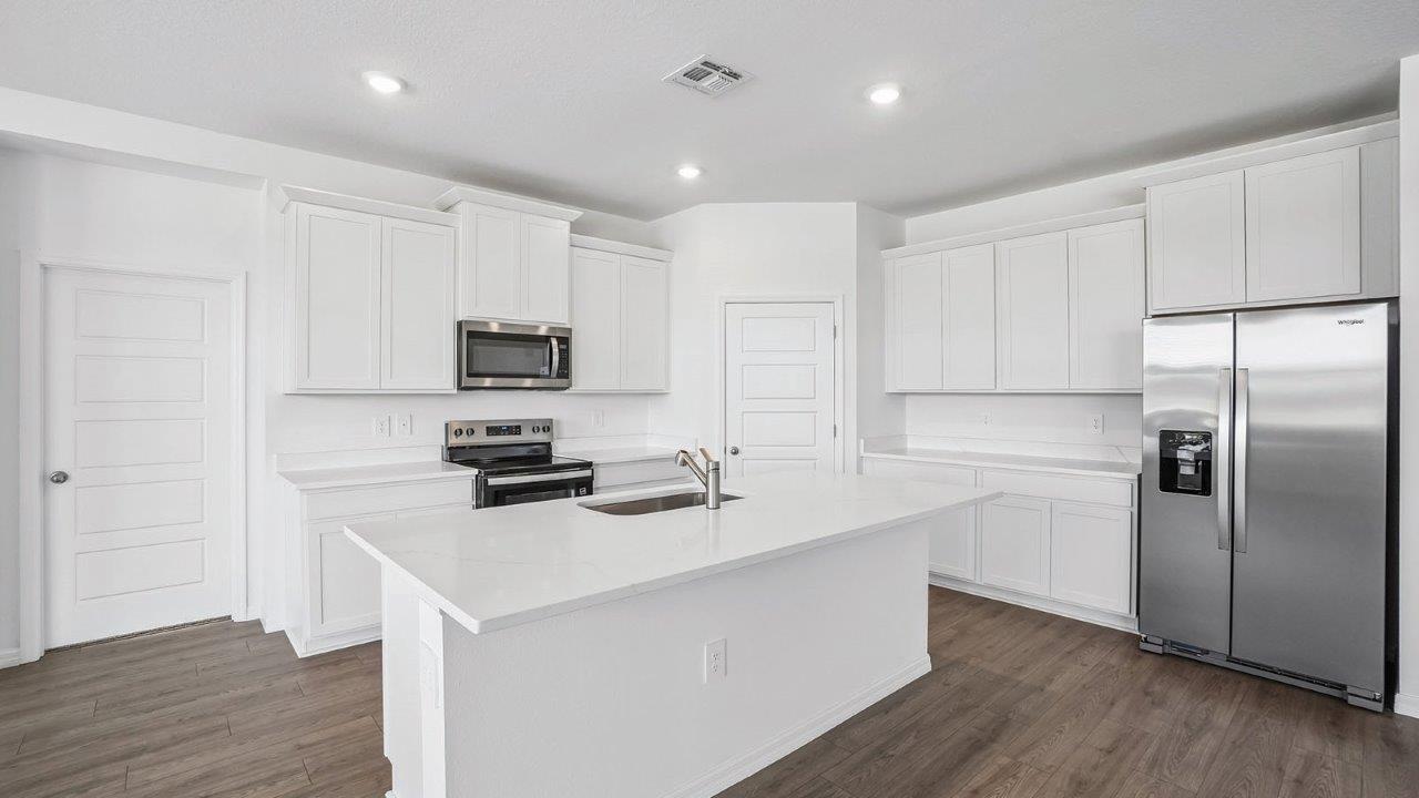 Kitchen with white cabinets