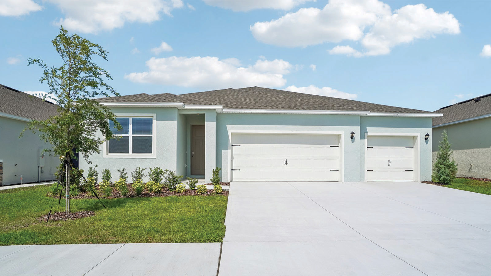 One story home exterior tan color home