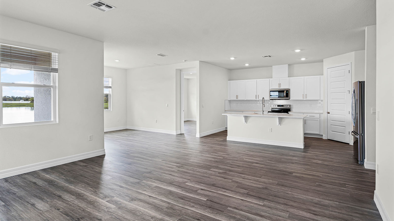 living room with view of kitchen and dining room