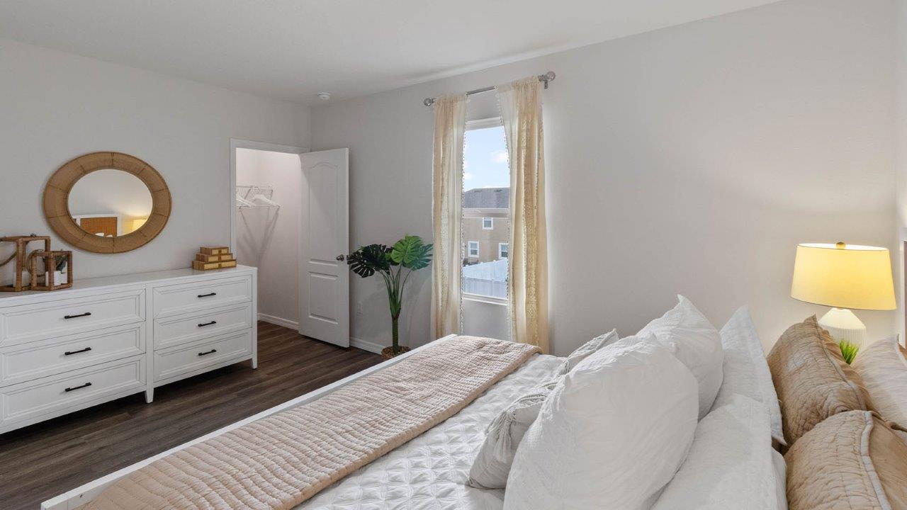 Primary bedroom with walk in closet