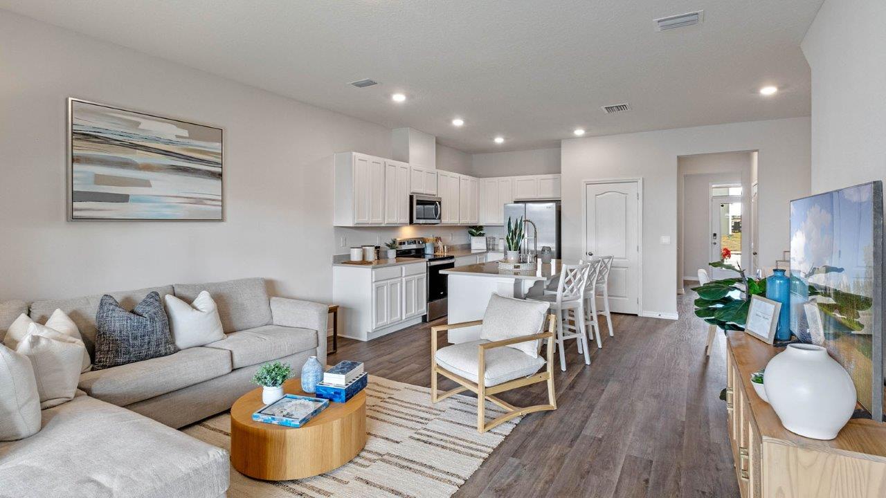 Living room with view of kitchen