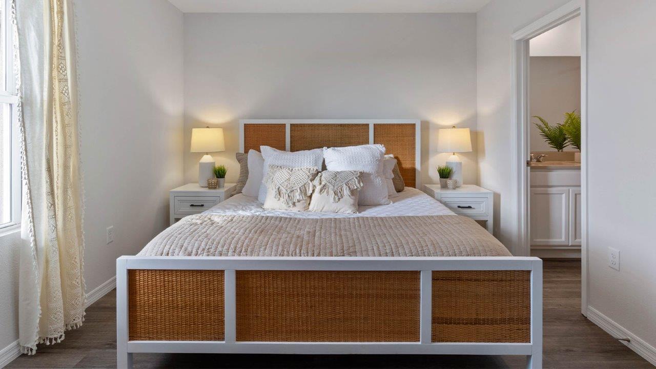 Primary Bedroom with king size bed and attached primary bathroom