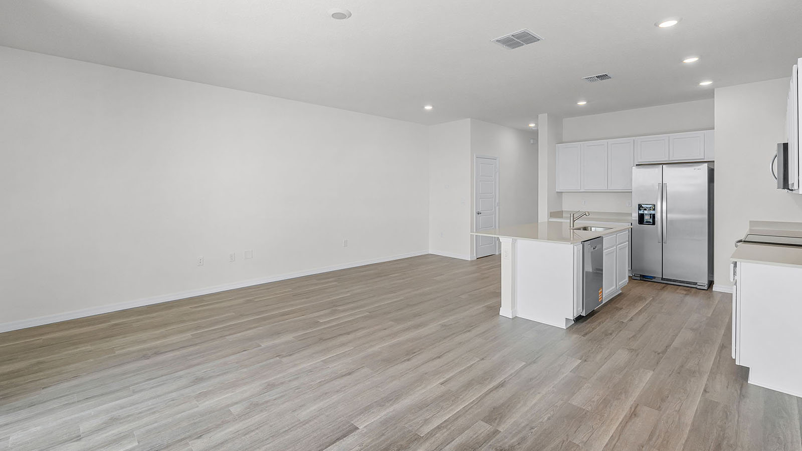 Living room with view of the kitchen