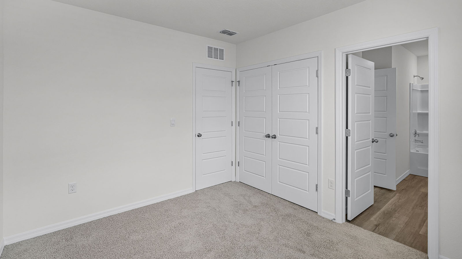 Guest bedroom with connecting bathroom