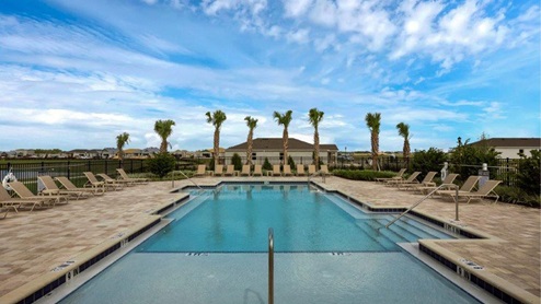 Lake side Pool amenity with covered patio