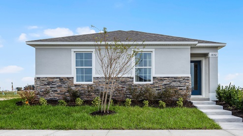 Rear load exterior with garage in the backyard