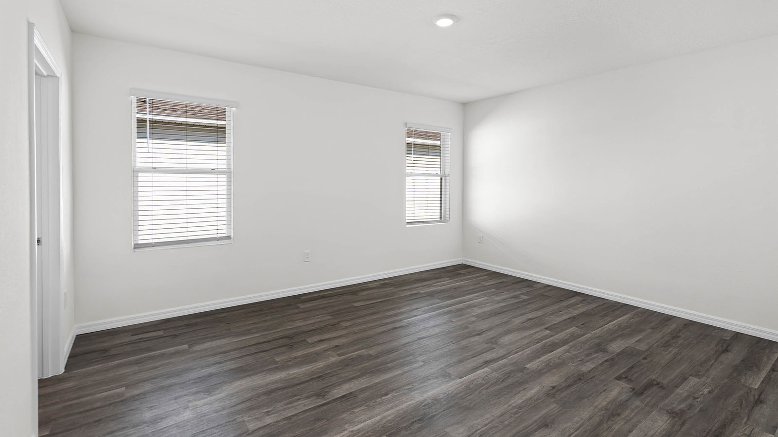 primary bedroom with two windows