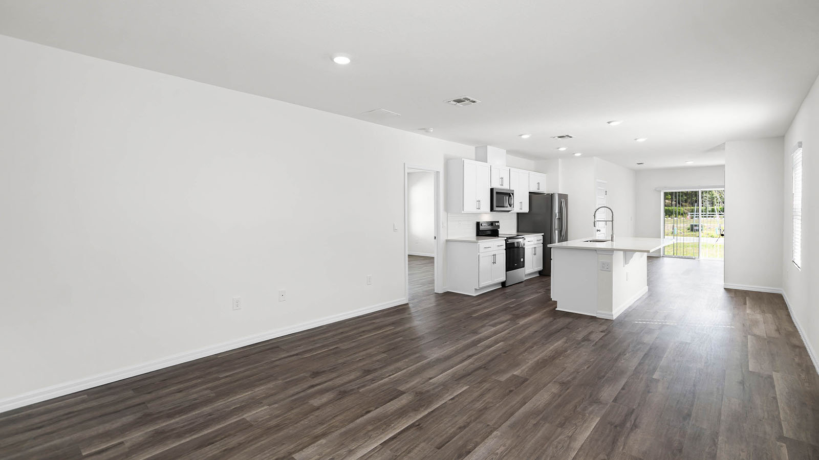 living room with view of the kitchen