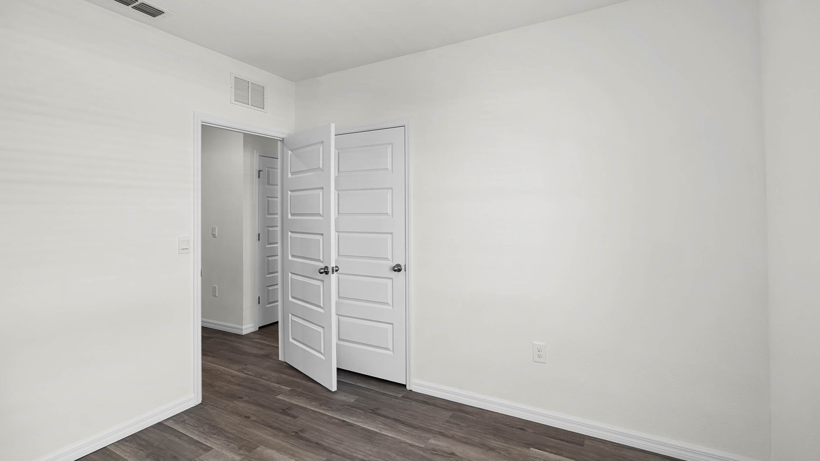 second guest bedroom showing entry door