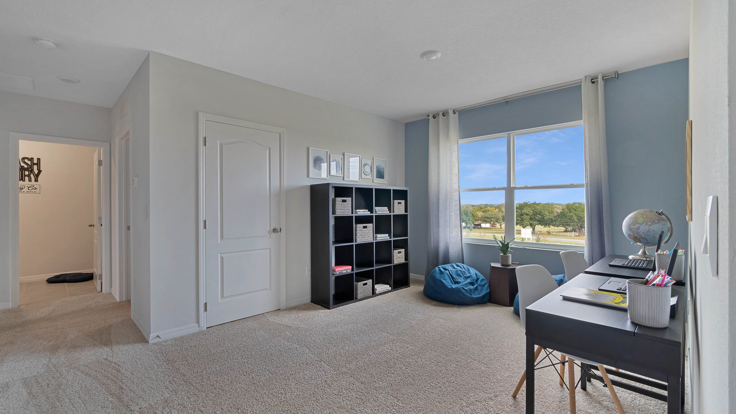 Dining nook with 4 person table and sliding glass door