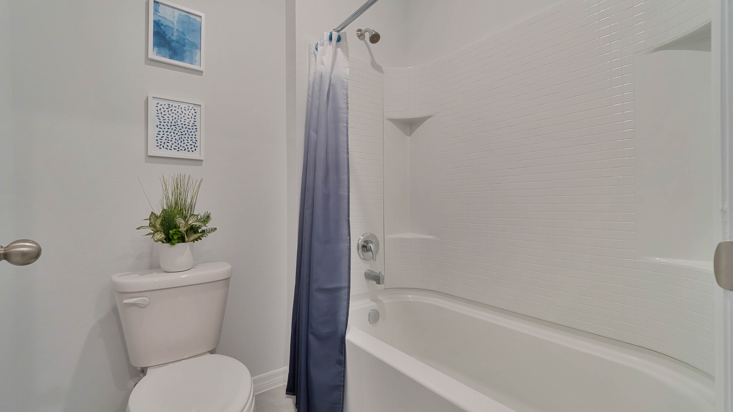 Primary bathroom with walk in shower and two closets