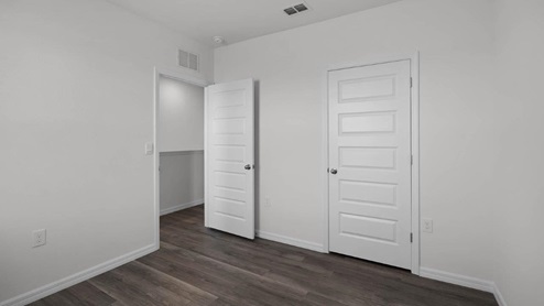 guest bedroom with closet