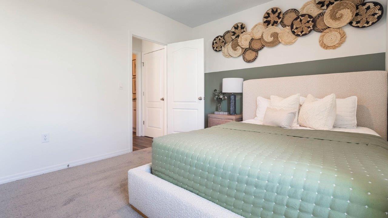 main-floor guest room with queen size bed