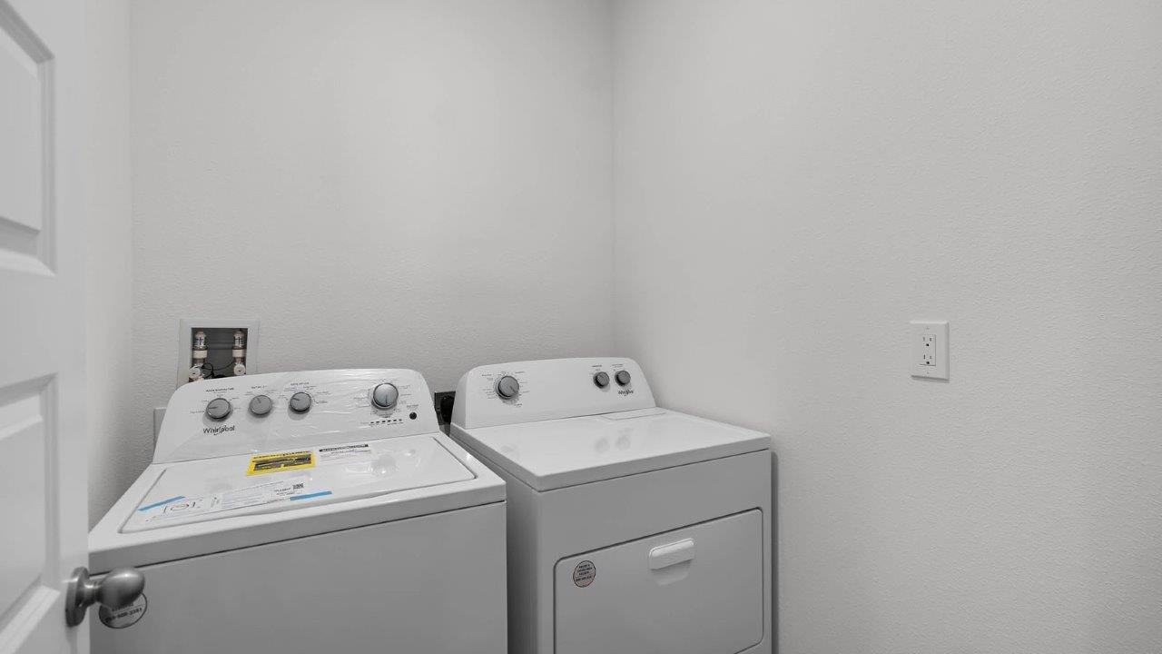 Laundry room with washer and dryer