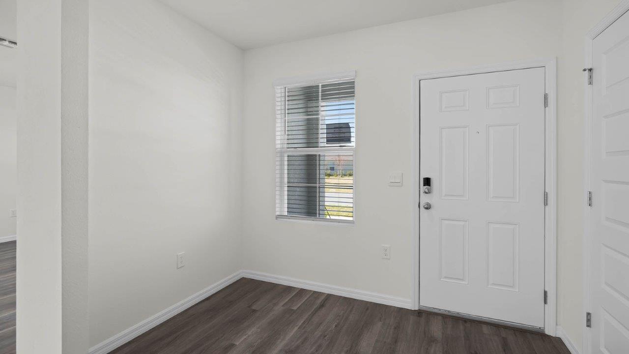 Home Entrance with small window by the door