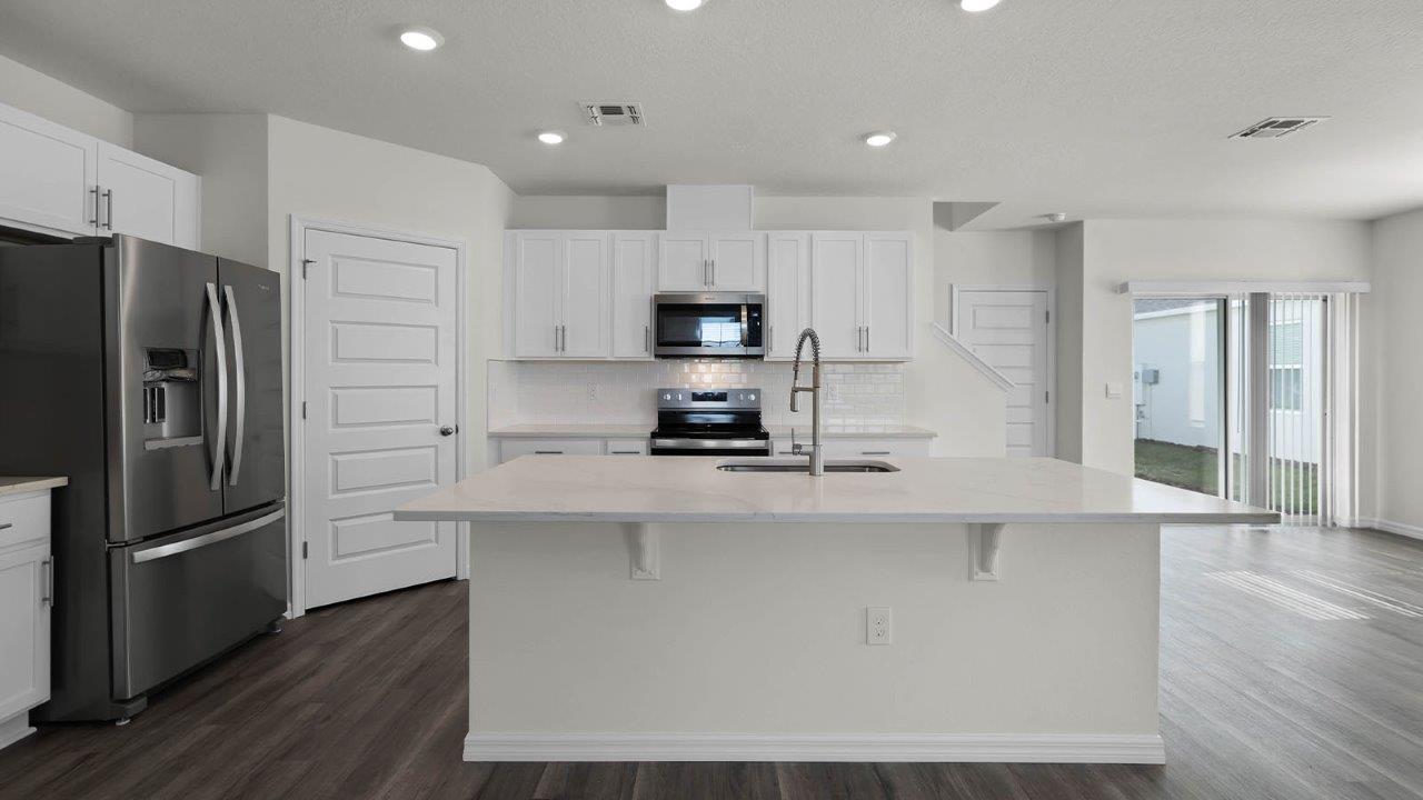 Kitchen Island with stainless steel appliances