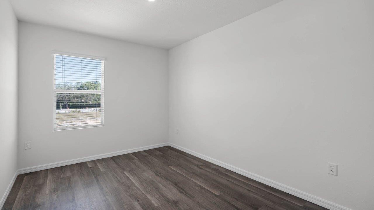 Third guest bedroom unfurnished with window