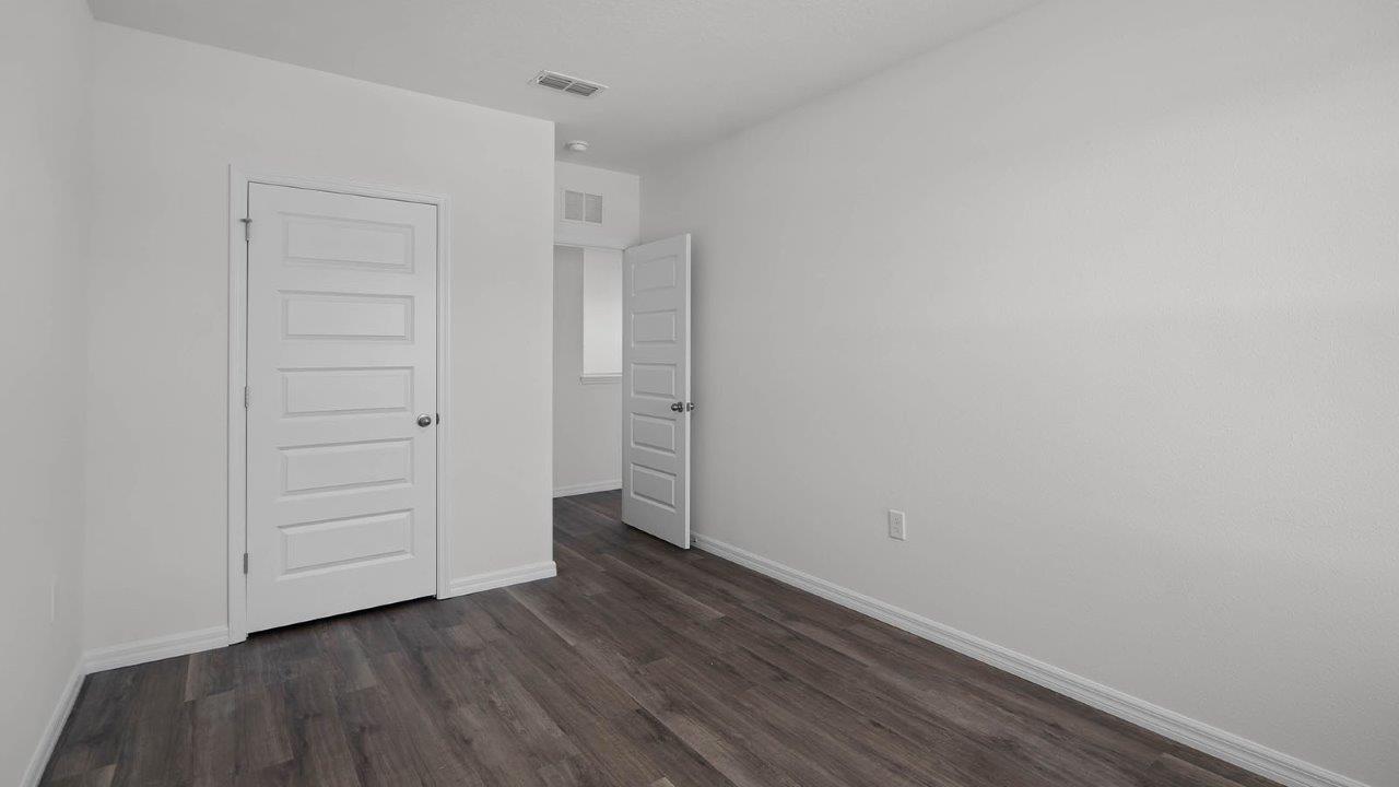 Fourth guest bedroom with closet