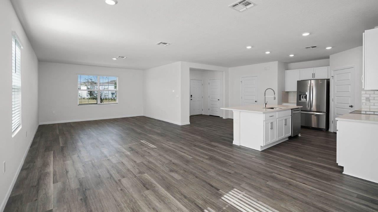 Living room and Kitchen and entry way to the home