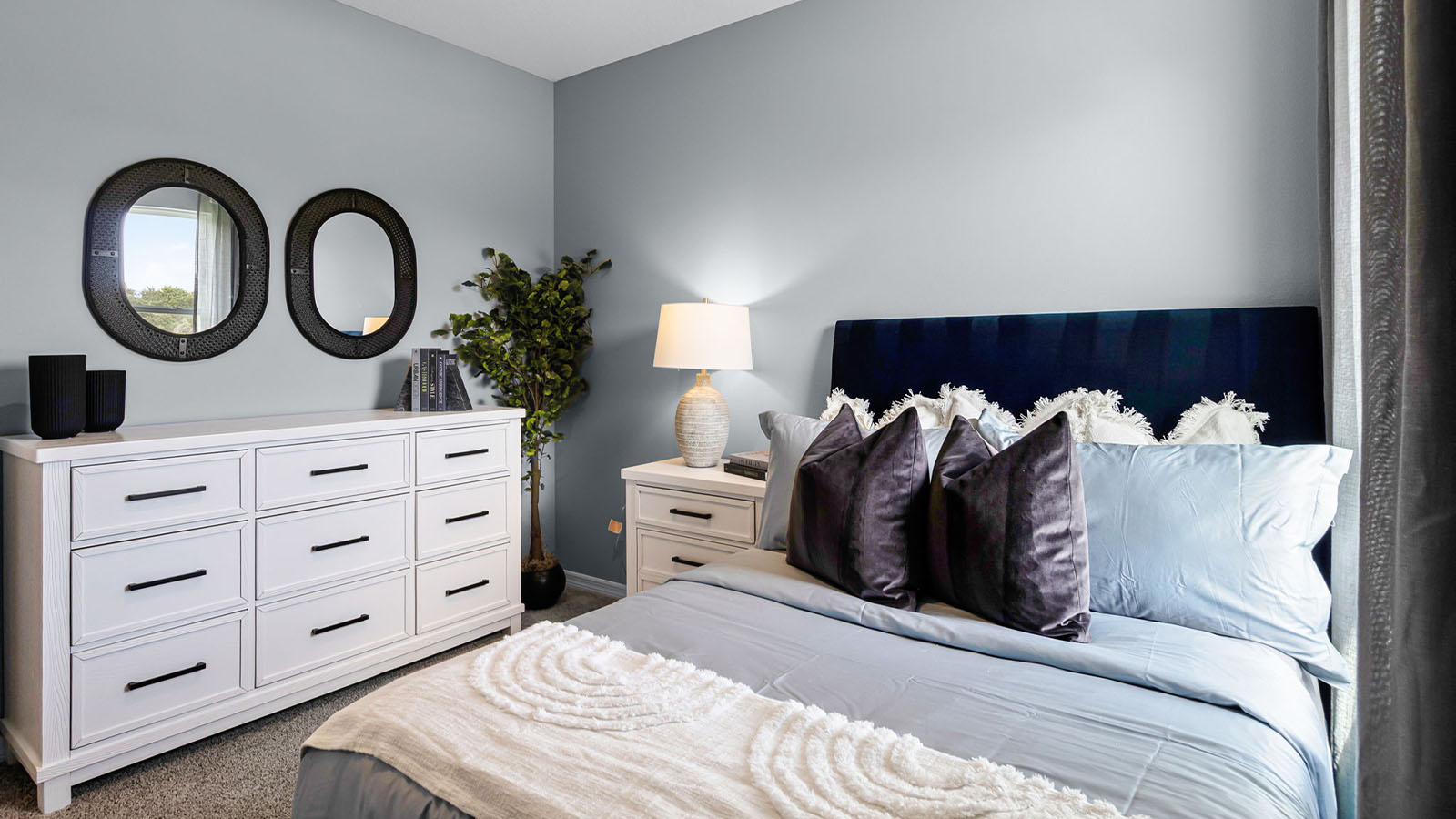 Guest bedroom showing dresser