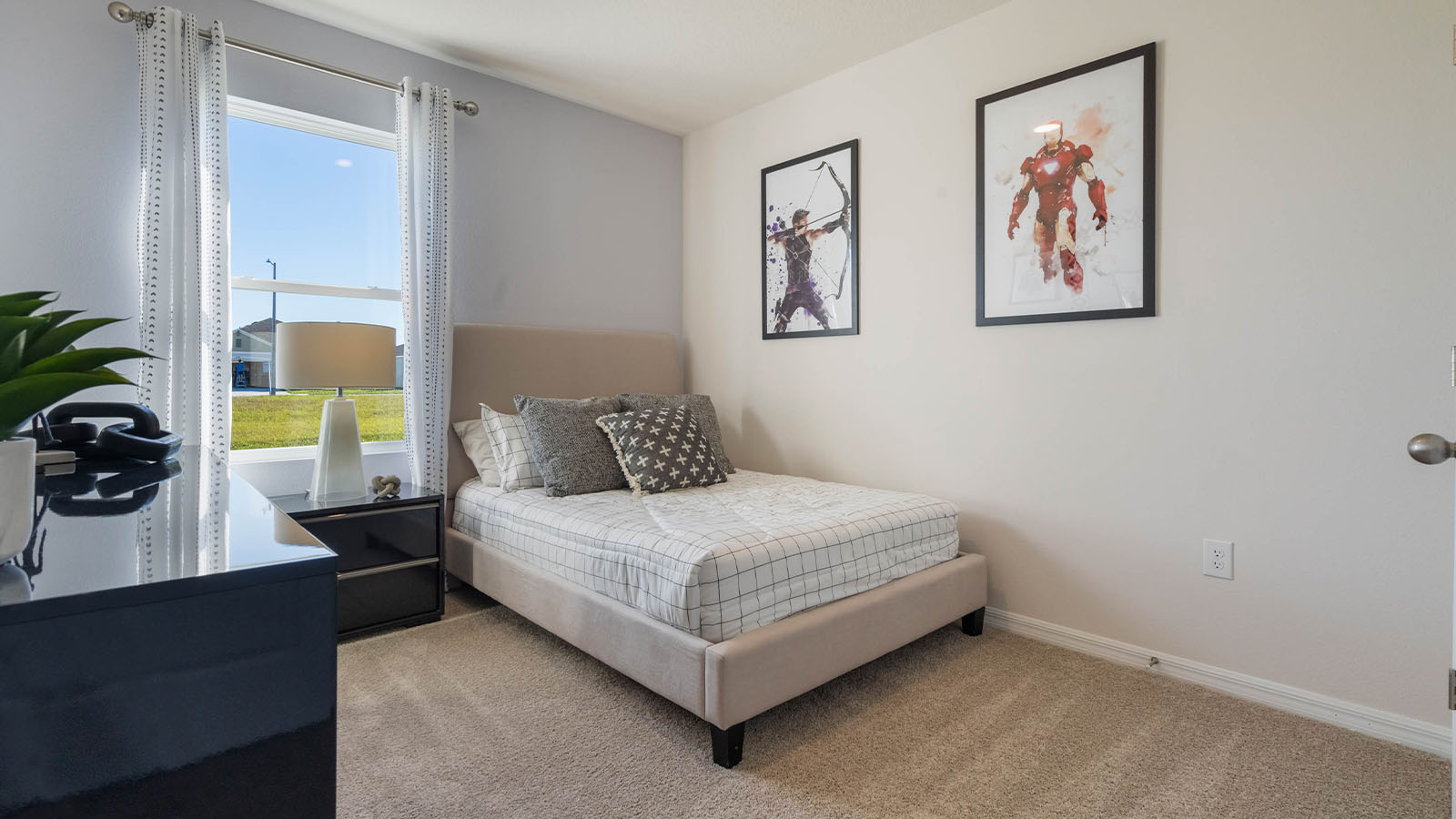 Guest bedroom with carpet throughout the room