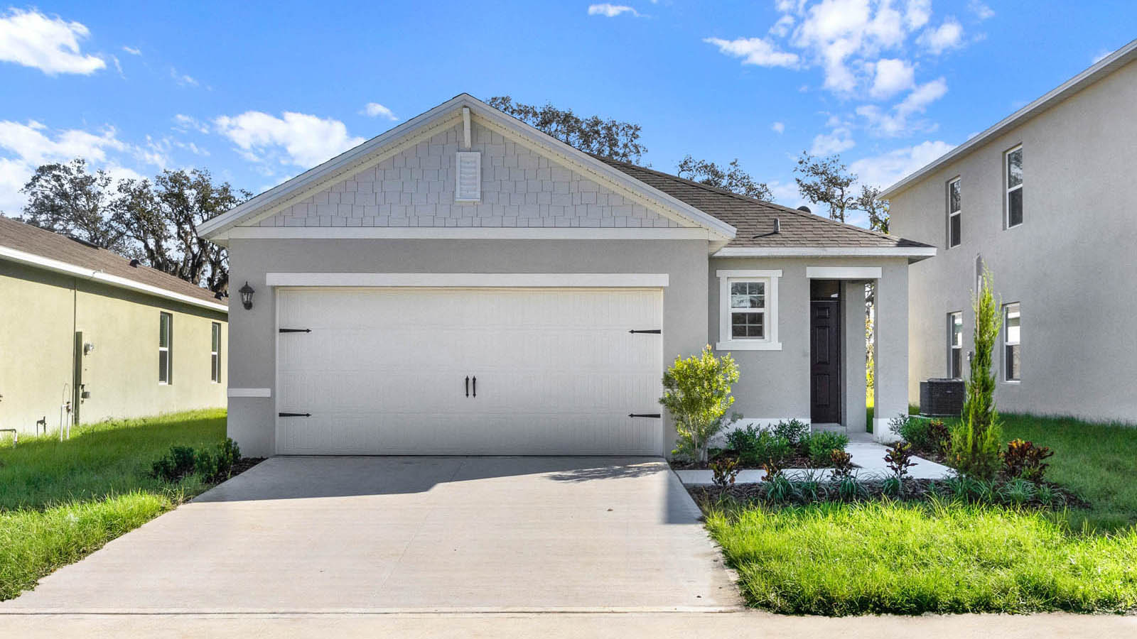 Exterior single family home with two car garage