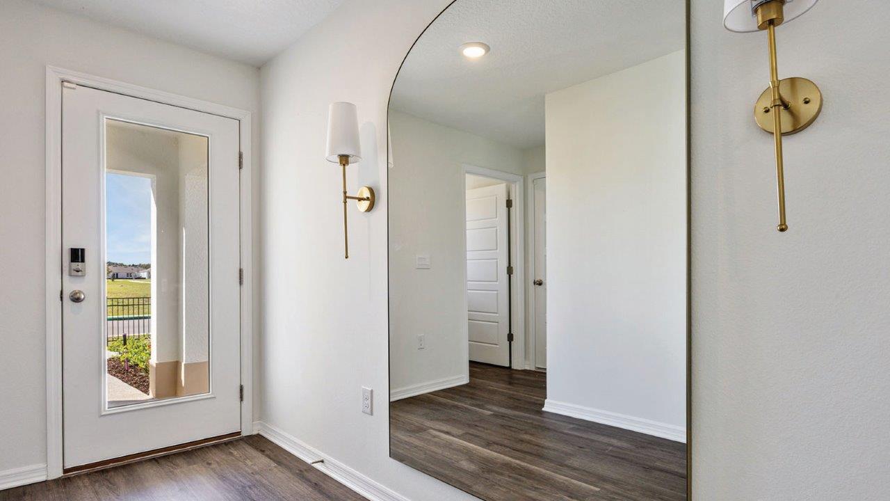 Entry way with large mirror