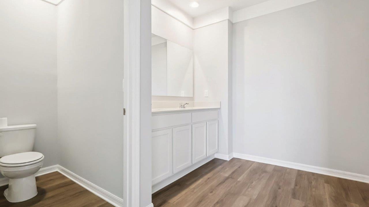 Primary bathroom with dual vanity sink