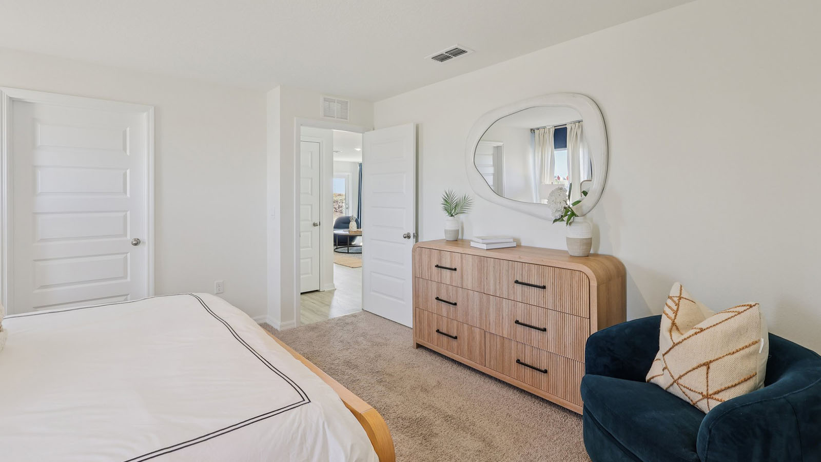 Primary bedroom with attached bathroom