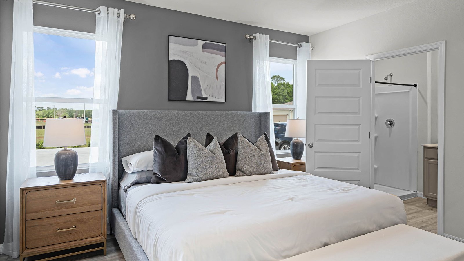Primary bedroom with private bathroom and closet
