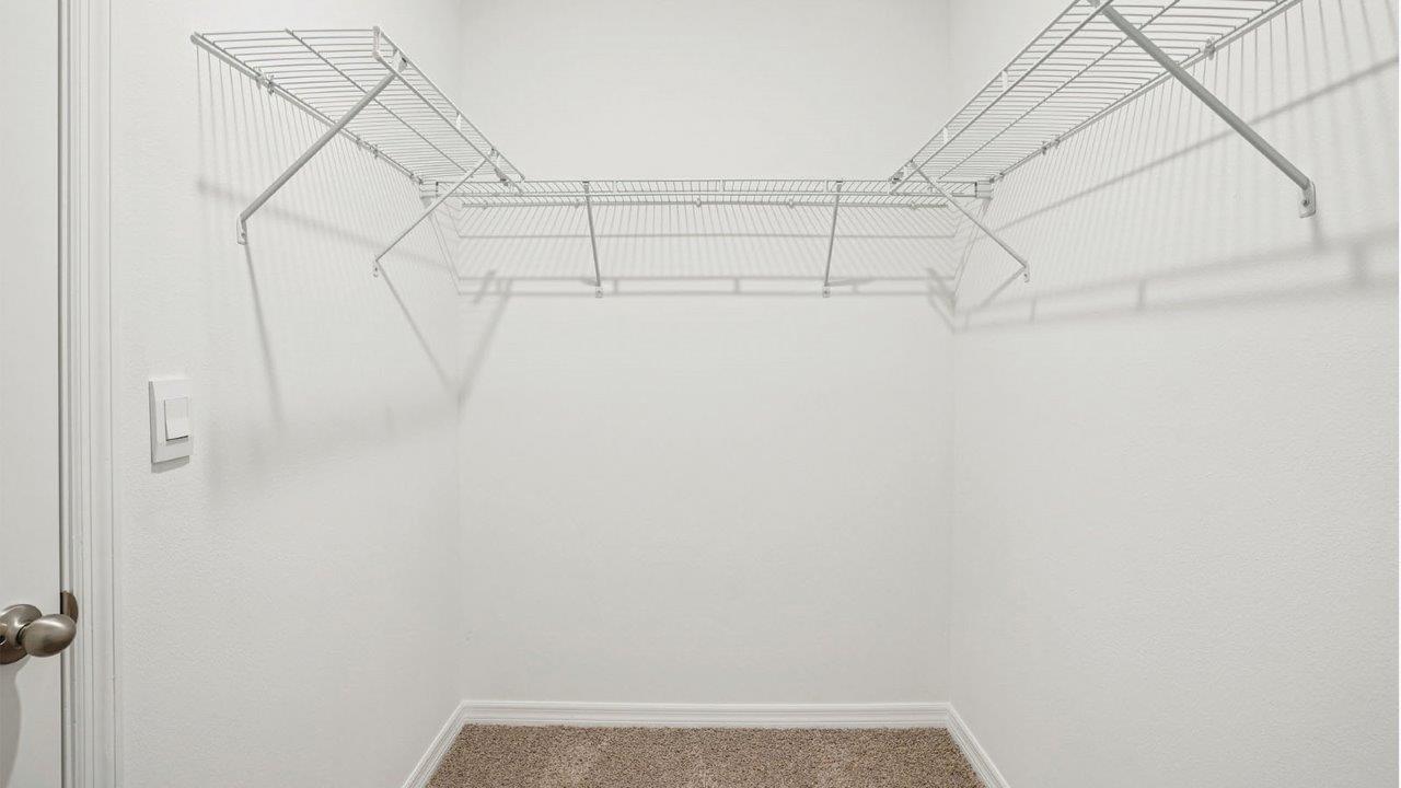 primary closet with wire racks