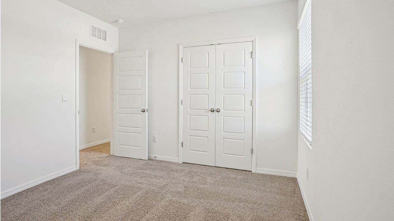 guest bedroom with built in closet