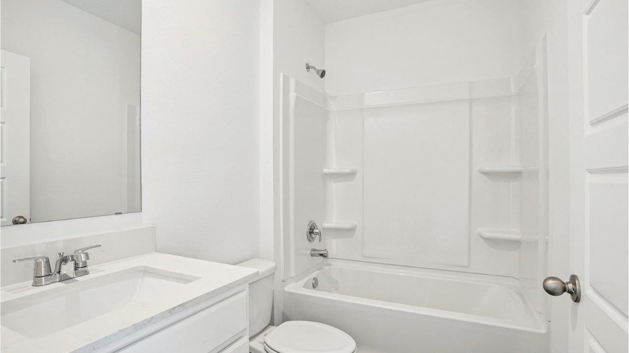 guest bathroom with shower/tub