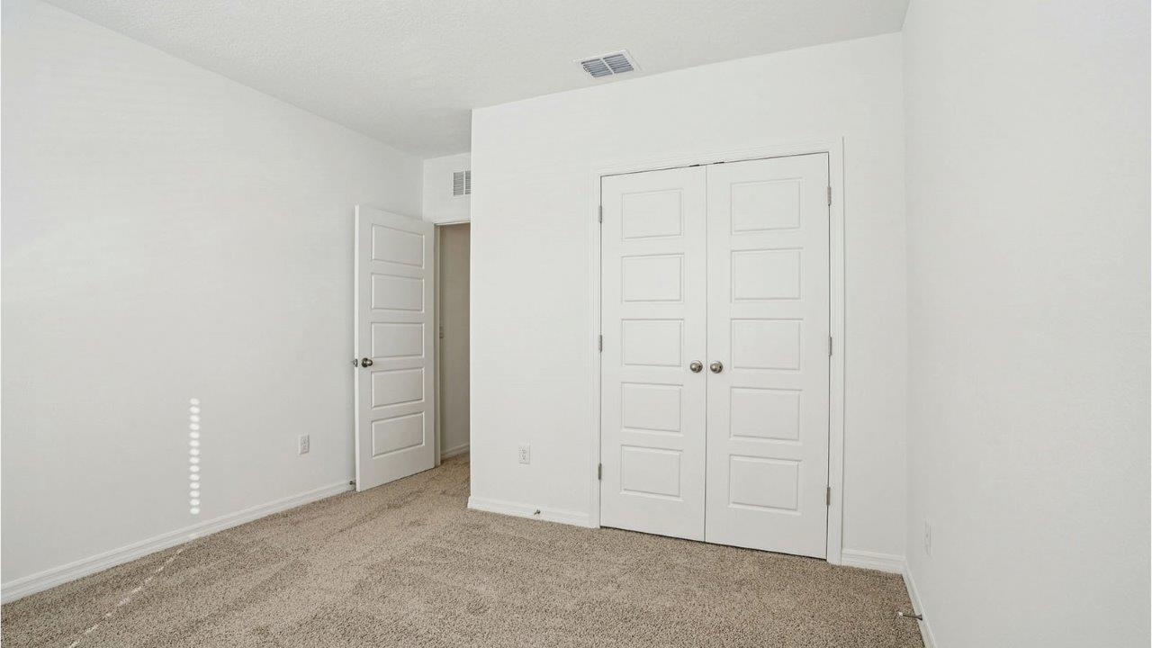 guest bedroom with built in closet