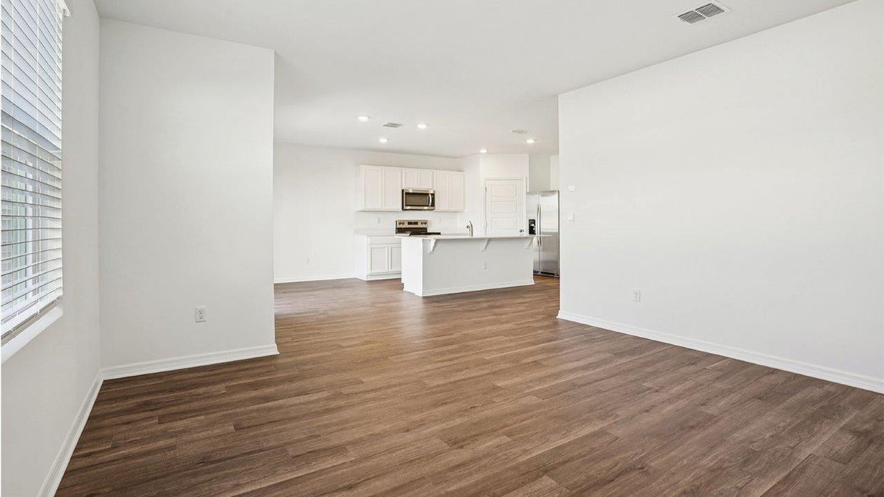 living room with view of kitchen area