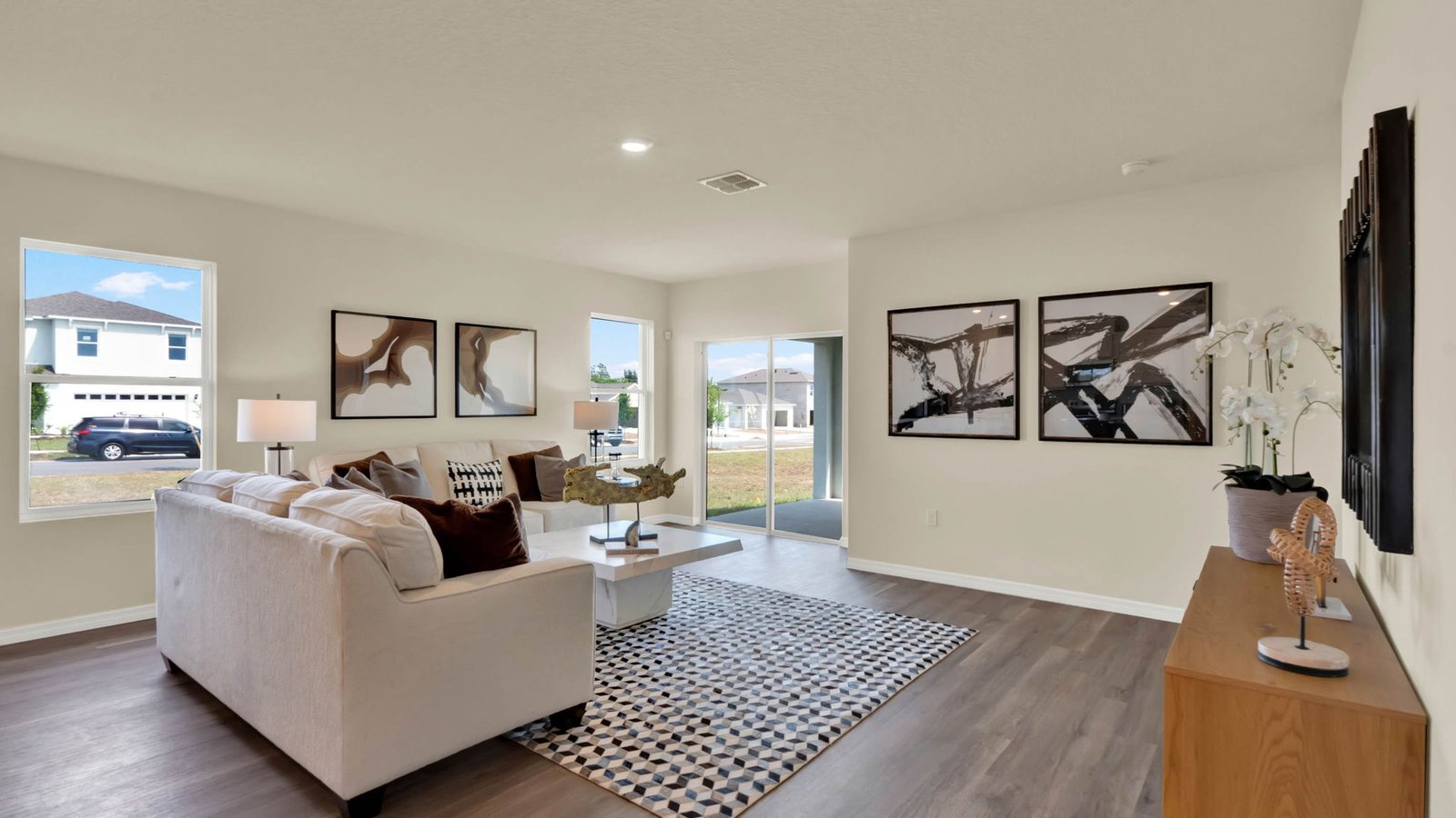 Living room with couches and wall art